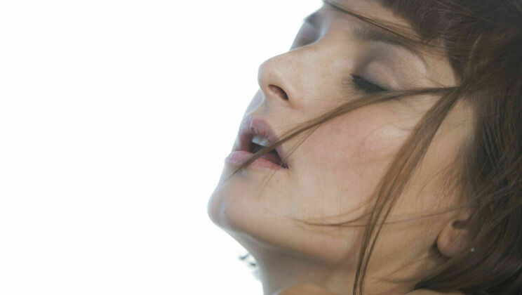 [SexArt] - Flora's Sexy Solo Romp: Glasses, Thong, and Nipples on Display